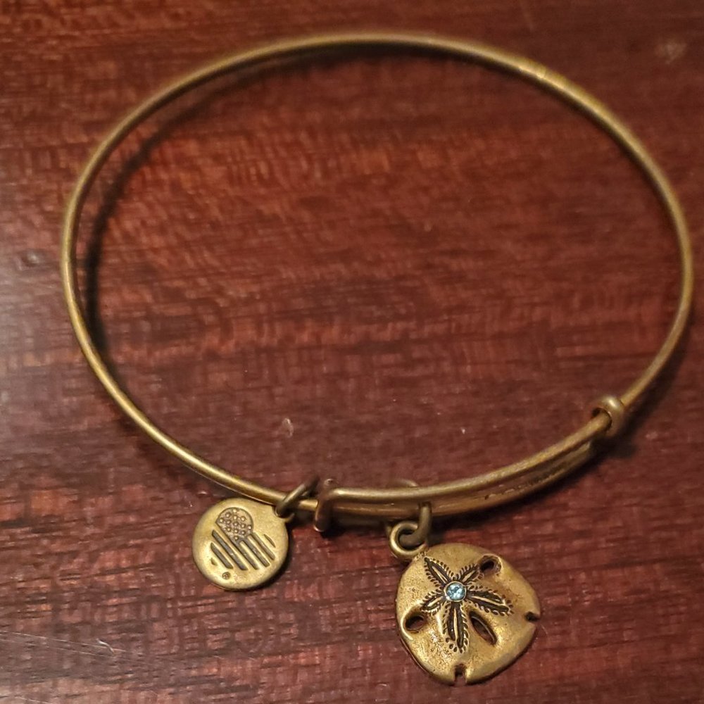 Alex and Ani sand dollar and blue crystal accent bracelet